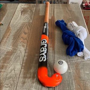 Grays field hockey stick with ball and socks